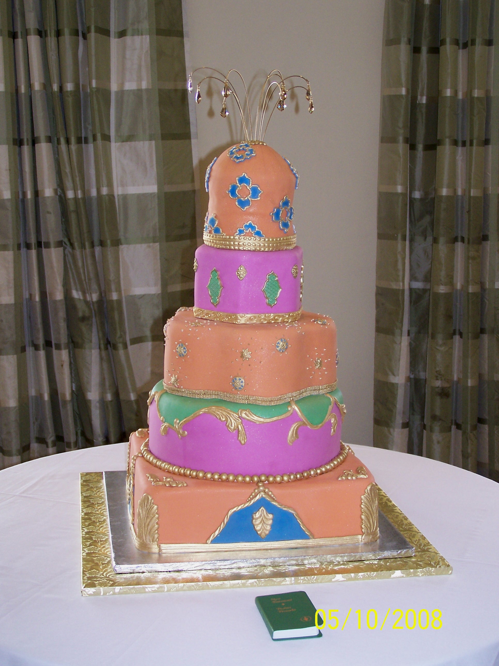 Orangeandpinkweddingcake.JPG
